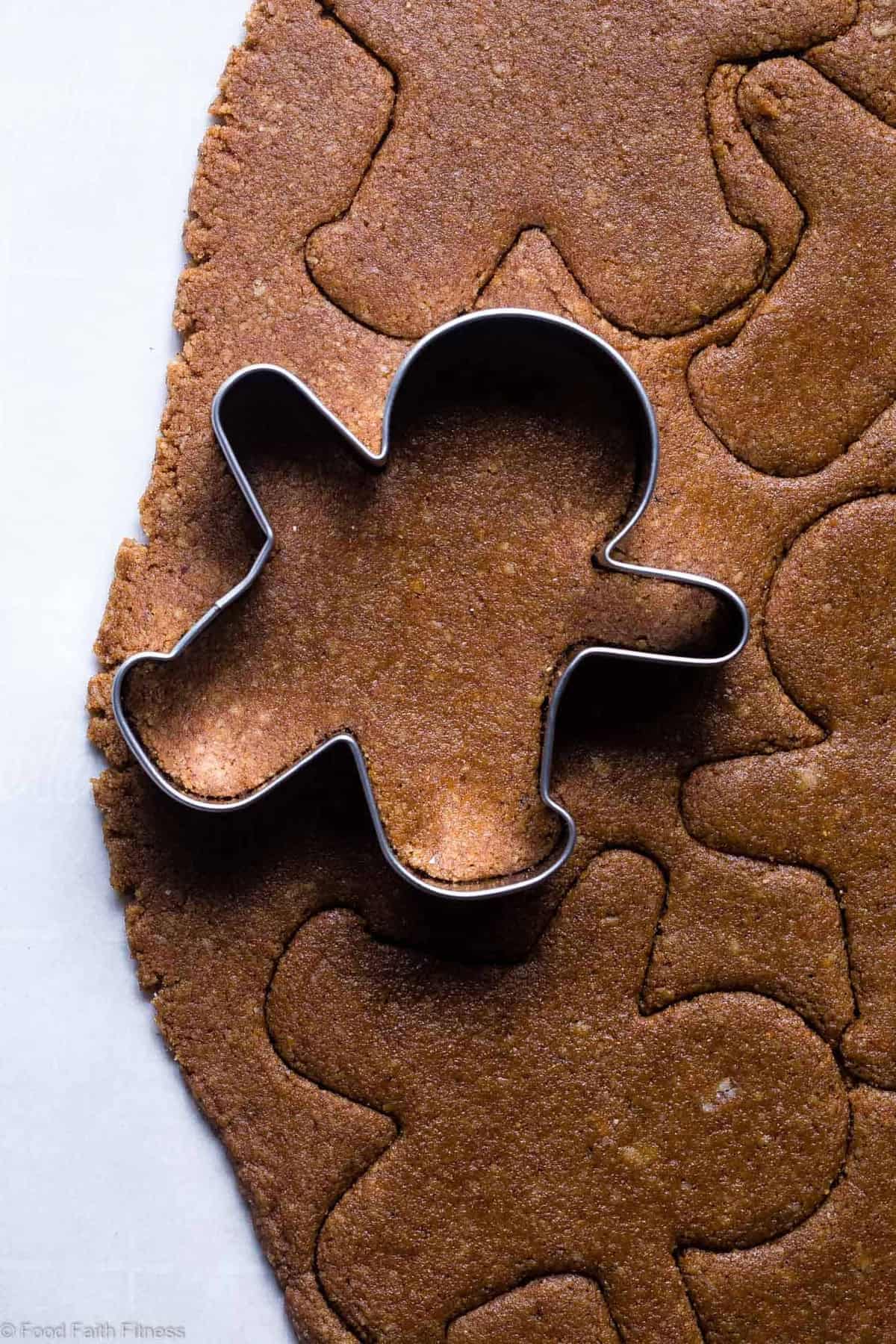 Gluten Free Paleo Gingerbread Cookies - These gingerbread cookies are perfectly spicy, sweet and crispy! An easy, delicious holiday cookie that no one will know are healthy and gluten/grain/dairy/refined sugar free! | #Foodfaithfitness | Paleo Healthy Gluten Free Gingerbread Cookies - This gluten free gingerbread cookie recipe is perfectly spicy, sweet and crispy! An easy, delicious holiday cookie that no one will know are healthy and gluten/grain/dairy/refined sugar free! | #Foodfaithfitness |