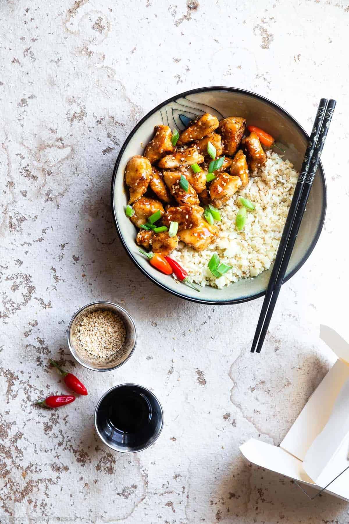 Paleo Easy Gluten Free Healthy Sesame Chicken Recipe - This paleo friendly, and sugar/grain/dairy and gluten free CRISPY easy Sesame Chicken tastes just like takeout but is SO much better for you! A quick dinner that the whole family will love! | #Foodfaithfitness | #Glutenfree #Paleo #Whole30 #Sugarfree #Healthy
