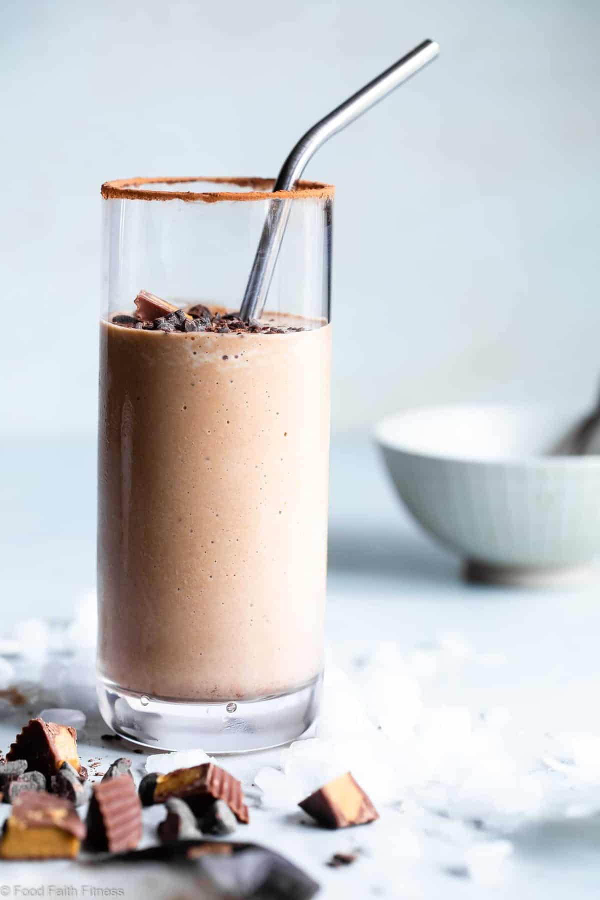 Peanut Butter Chocolate Keto Low Carb Smoothie - An EASY 5 ingredient breakfast that tastes like a peanut butter cup! It's Gluten/dairy/sugar free, paleo friendly, SO creamy and packed with plant based protein too! | #Foodfaithfitness | #Glutenfree #paleo #keto #lowcarb #sugarfree Keto smoothie in a tall skinny glass with a straw in it