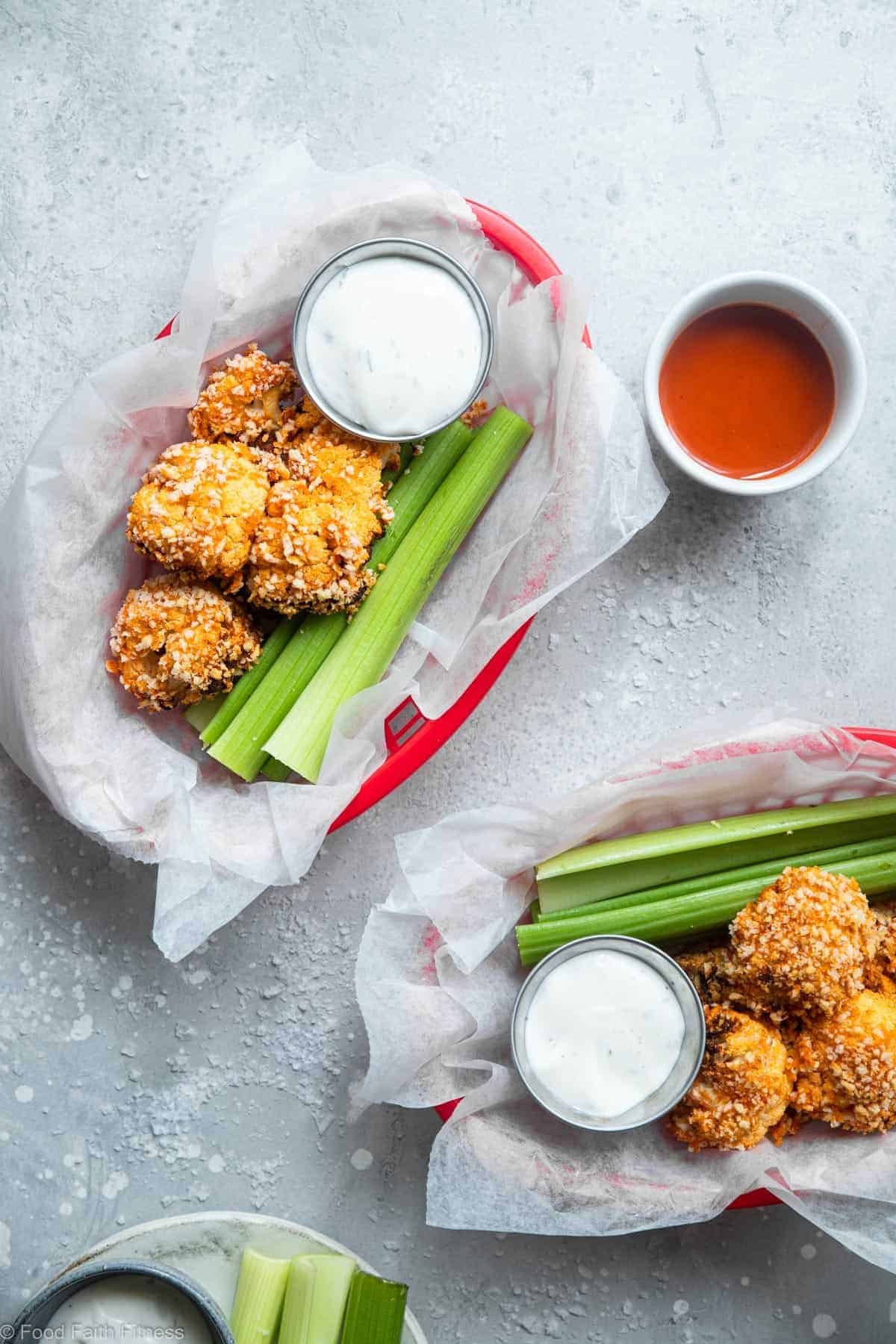 Air Fryer Buffalo Cauliflower - Air fried buffalo cauliflower wings are an easy recipe that even picky kids will love! Gluten free and vegan option and so crispy and crunchy too! | #Foodfaithfitness | #Glutenfree #Cauliflower #Healthy #AirFryer #Vegan Buffalo air fried cauliflower in two baskets on a table
