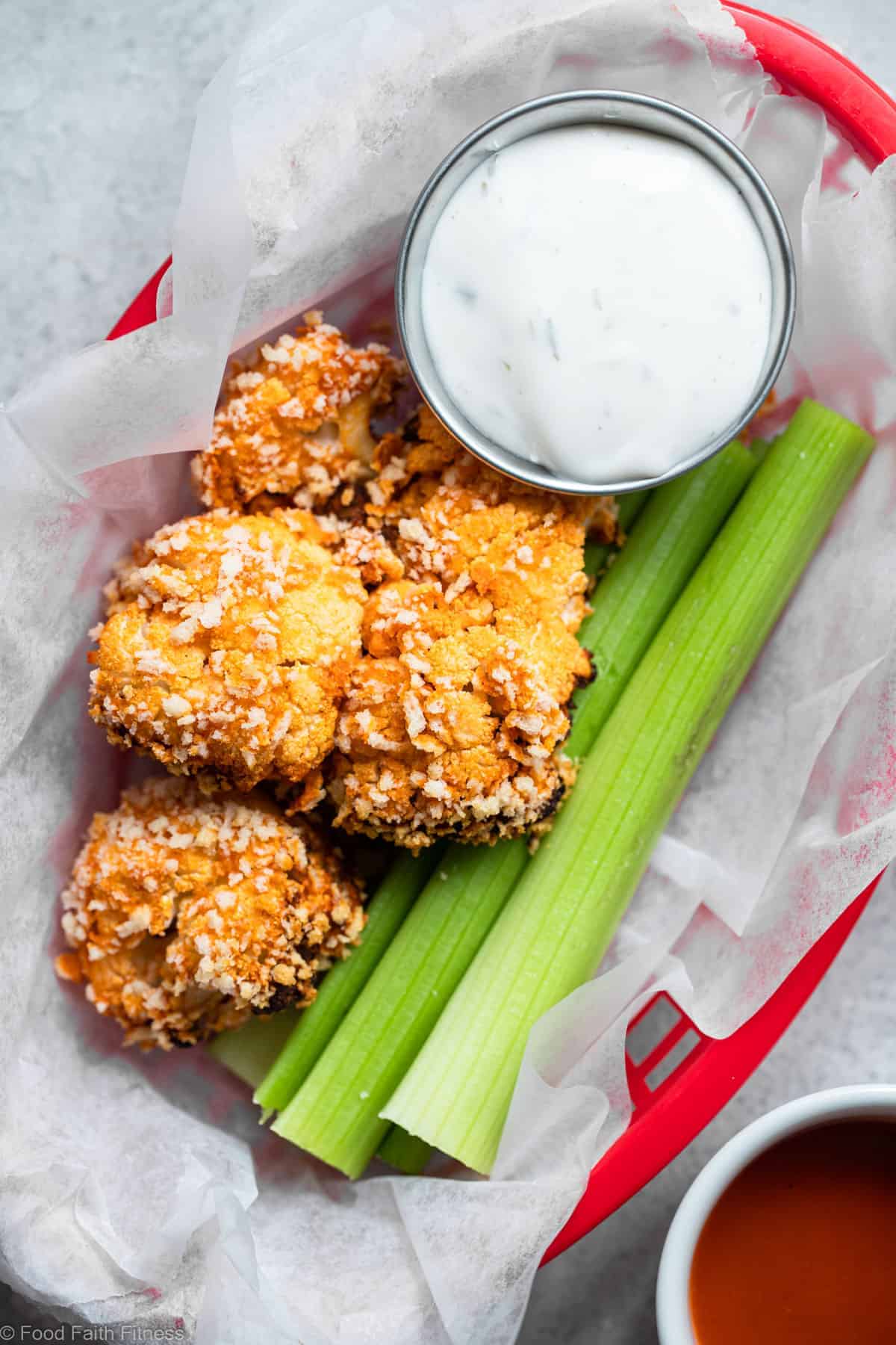 Air Fryer Buffalo Cauliflower - Air fried buffalo cauliflower wings are an easy recipe that even picky kids will love! Gluten free and vegan option and so crispy and crunchy too! | #Foodfaithfitness | #Glutenfree #Cauliflower #Healthy #AirFryer #Vegan fried buffalo cauliflower close up
