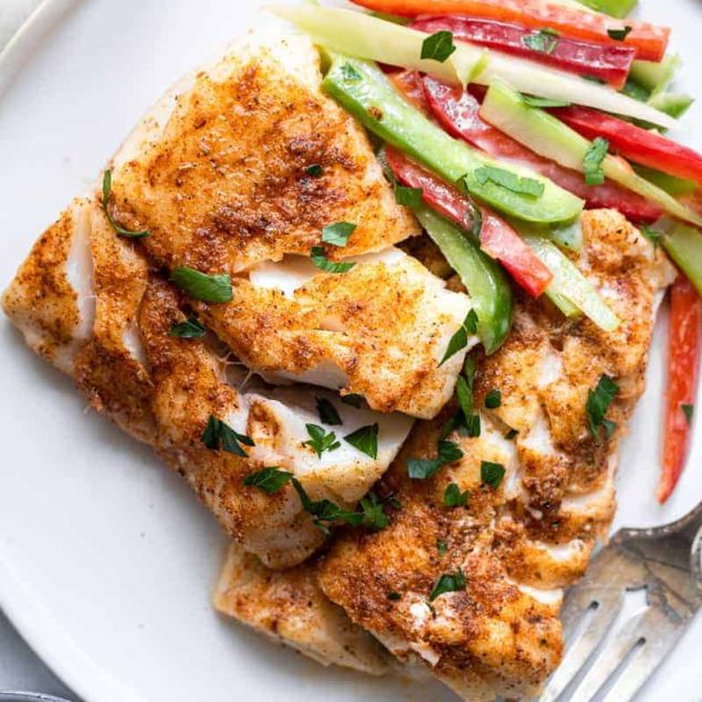 Cajun Grilled Cod with red pepper slaw on a plate