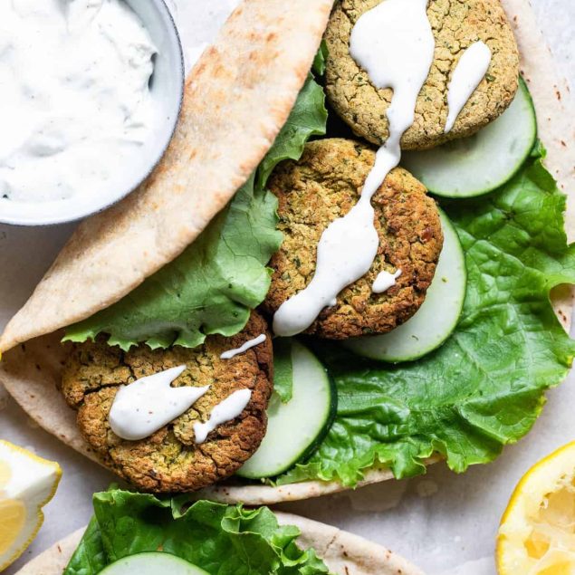 baked falafel in a pita bread with yogurt sauce