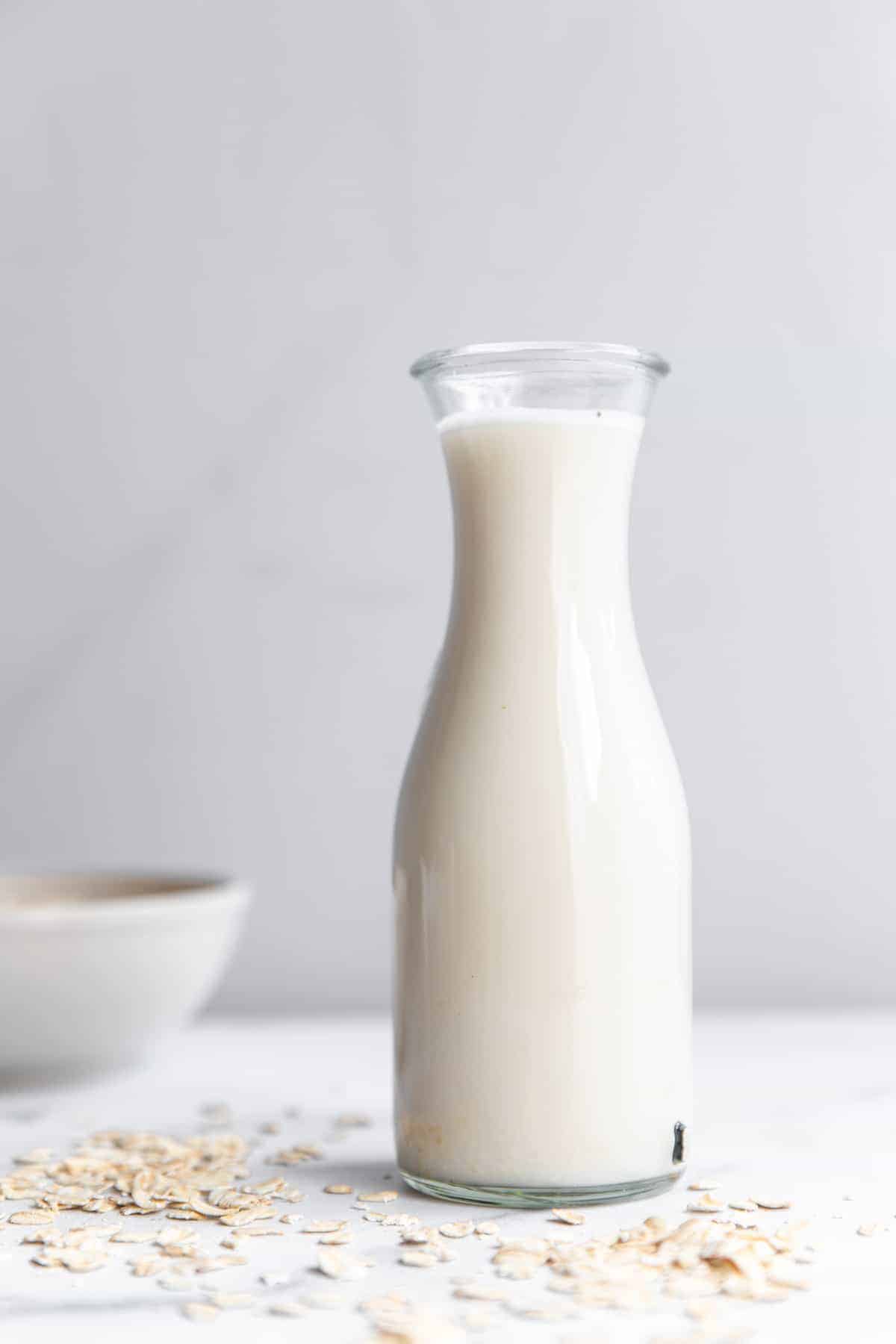 oat milk in a container on a table