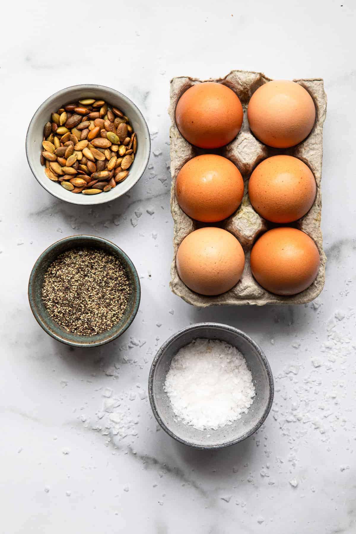 ingredients to make a hard boiled egg snack on a table