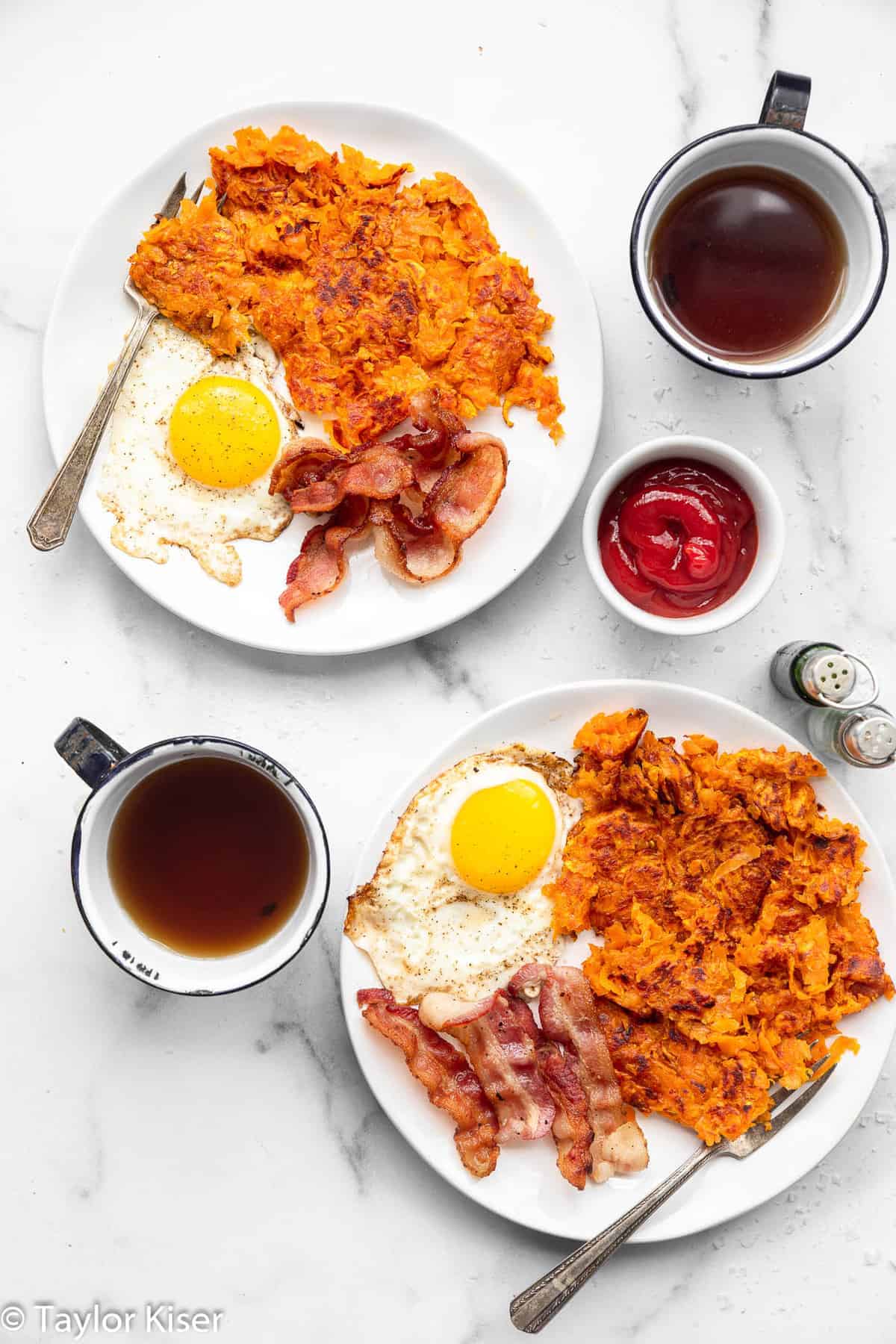 Easy Sweet Potato Hash Browns - These shredded Sweet Potato Hash Browns are easy and better than store bought! Naturally gluten free and healthy! Learn the secrets to making them crispy too! | #Foodfaithfitness | #glutenfree #paleo #healthy #whole30 #dairyfree shredded sweet potato hash browns on a plate with eggs