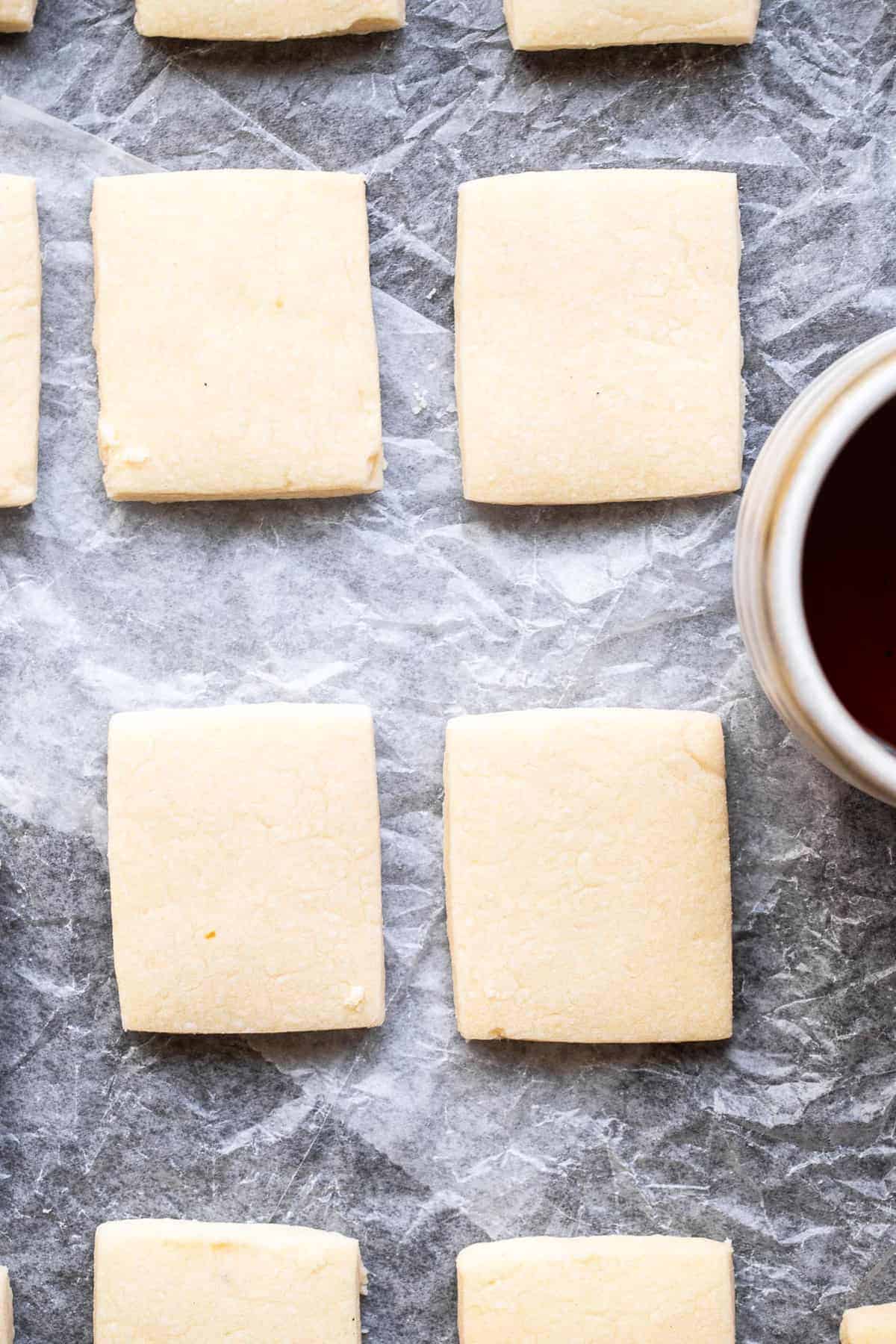 Dairy Free Vegan Shortbread Cookies - Crunchy, buttery but naturally dairy free and only 3 ingredients! Perfect for Christmas! | #Foodfaithfitness | #dairyfree #eggfree #nutfree #vegan #shortbread close up overhead of dairy free vegan shortbread cookies
