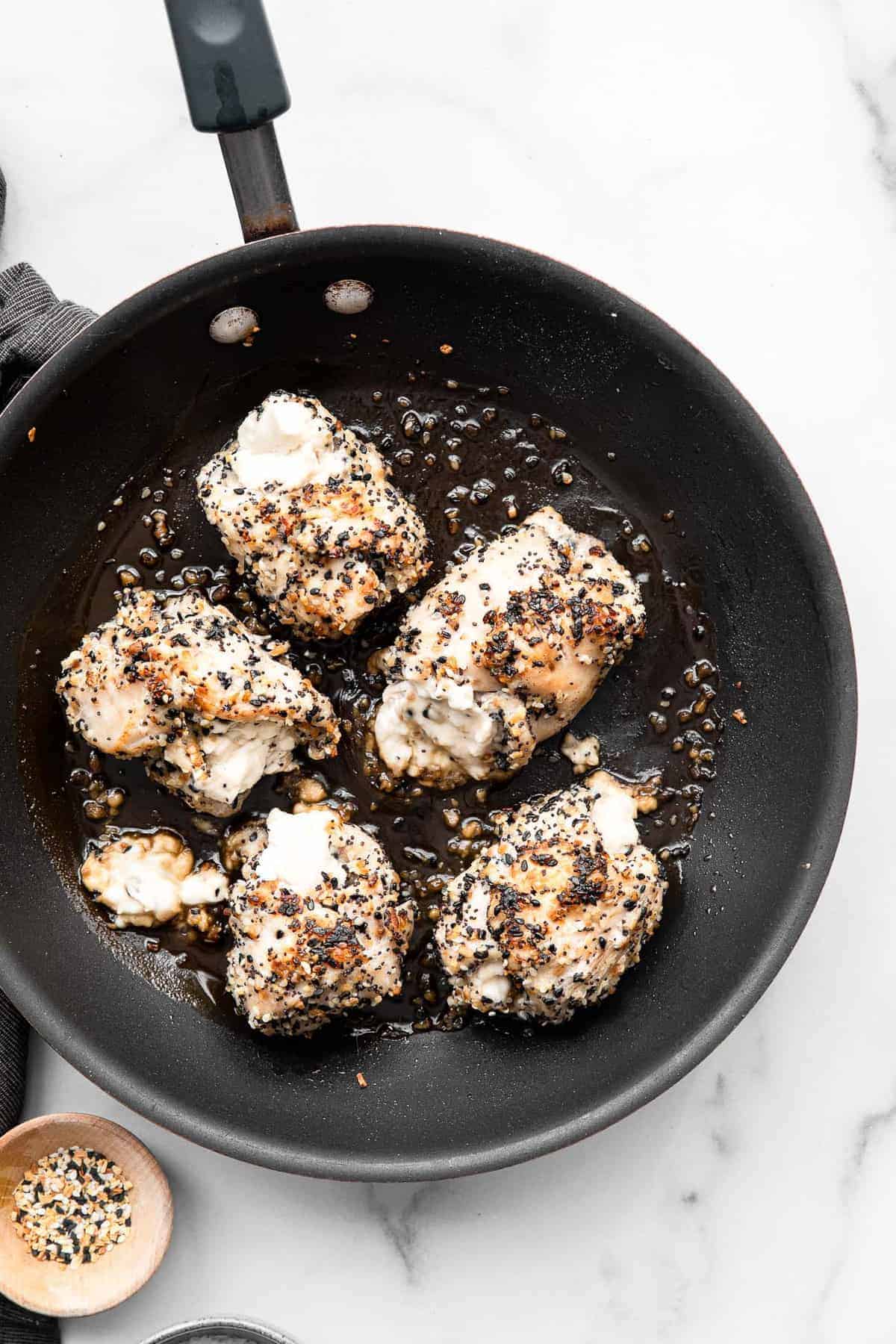 5 everything but the bagel chicken breast in a skillet