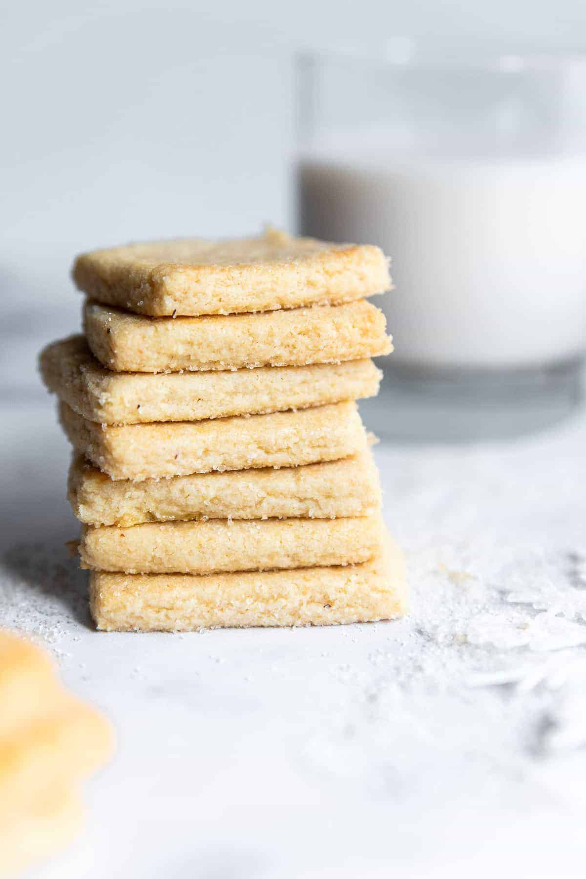 Gluten Free Almond Flour Shortbread Cookies - Only 6 simple ingredients and melt in your mouth! Naturally gluten free, delicious and perfect for the holidays! | #Foodfaithfitness | #Glutenfree #christmas #shortbread #healthy a stack of almond shortbread cookies