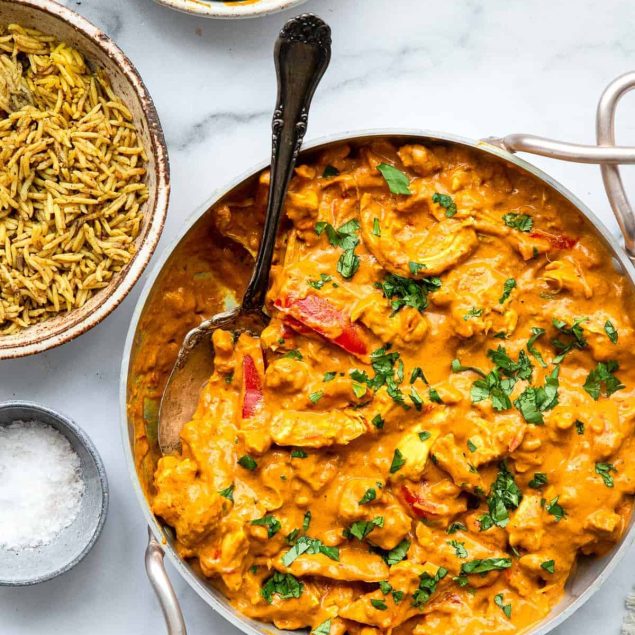 whole30 curry in a Indian pot with cilantro on top
