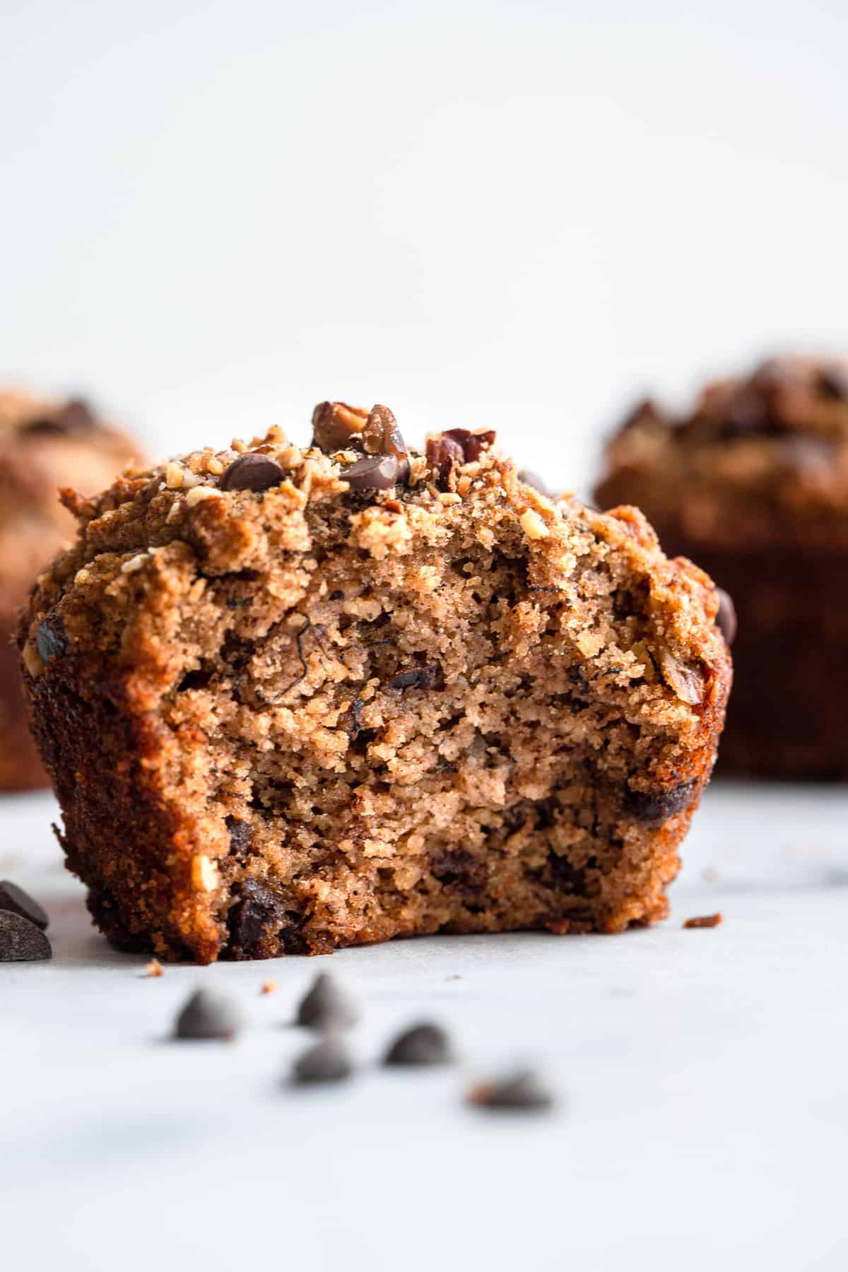 Paleo Banana Bread Muffins - These Paleo Banana Nut Muffins with Chocolate Chips are fluffy, soft and perfectly sweet! Naturally gluten free, dairy free and healthy! | #Foodfaithfitness | #glutenfree #paleo #healthy #dairyfree #muffins Almond Flour Paleo Banana Nut Muffins