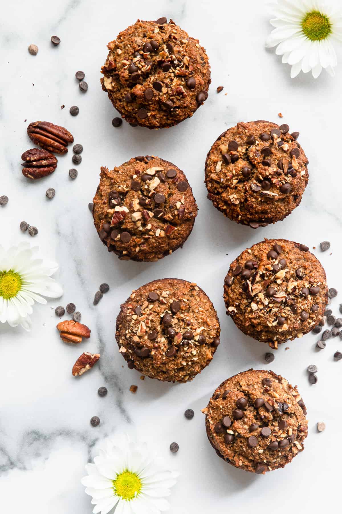 Paleo Banana Bread Muffins - These Paleo Banana Nut Muffins with Chocolate Chips are fluffy, soft and perfectly sweet! Naturally gluten free, dairy free and healthy! | #Foodfaithfitness | #glutenfree #paleo #healthy #dairyfree #muffins