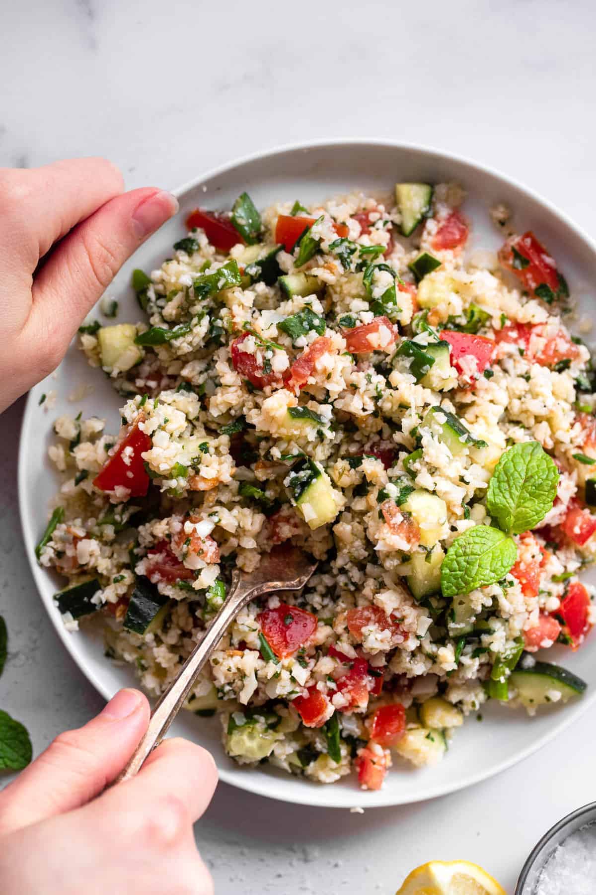 close up of Paleo Cauliflower Tabbouleh on a serving plate