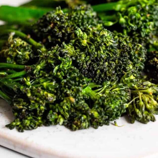 Sautéed broccolini stalks ready to be cooked