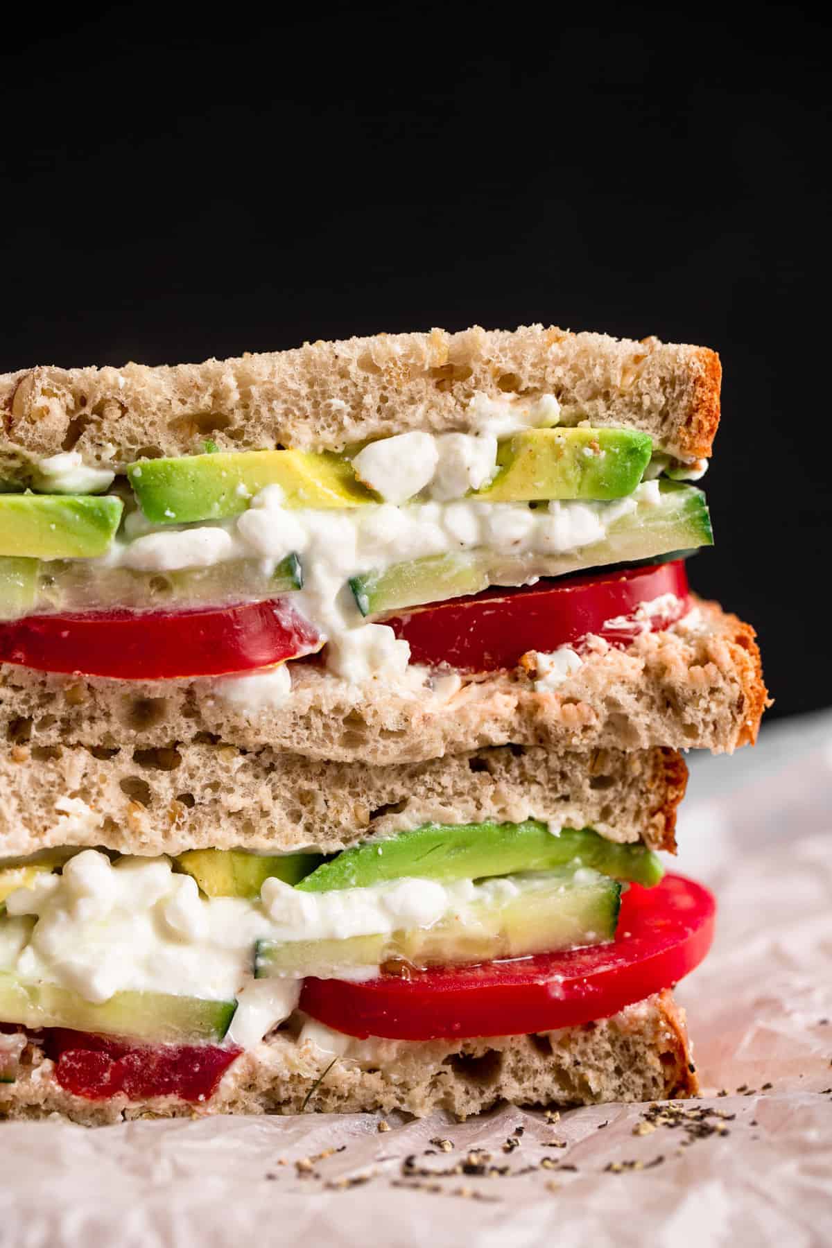 close up of cottage cheese sandwich sliced in half