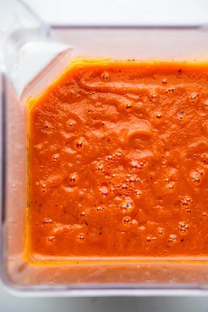 Instant Pot Southwestern Sweet Potato Soup in a blender being prepared