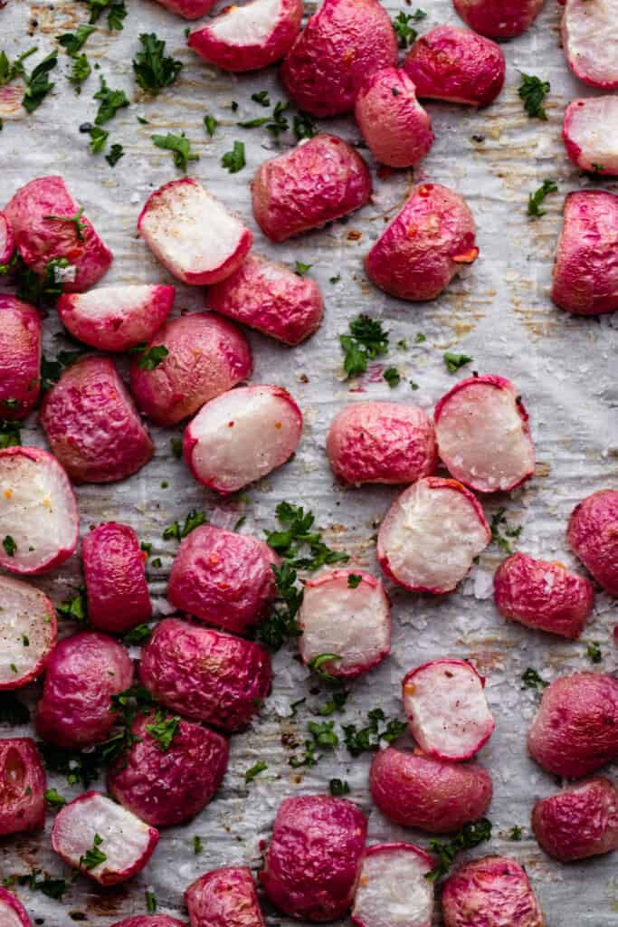 a baking sheet full of Roasted Radishes