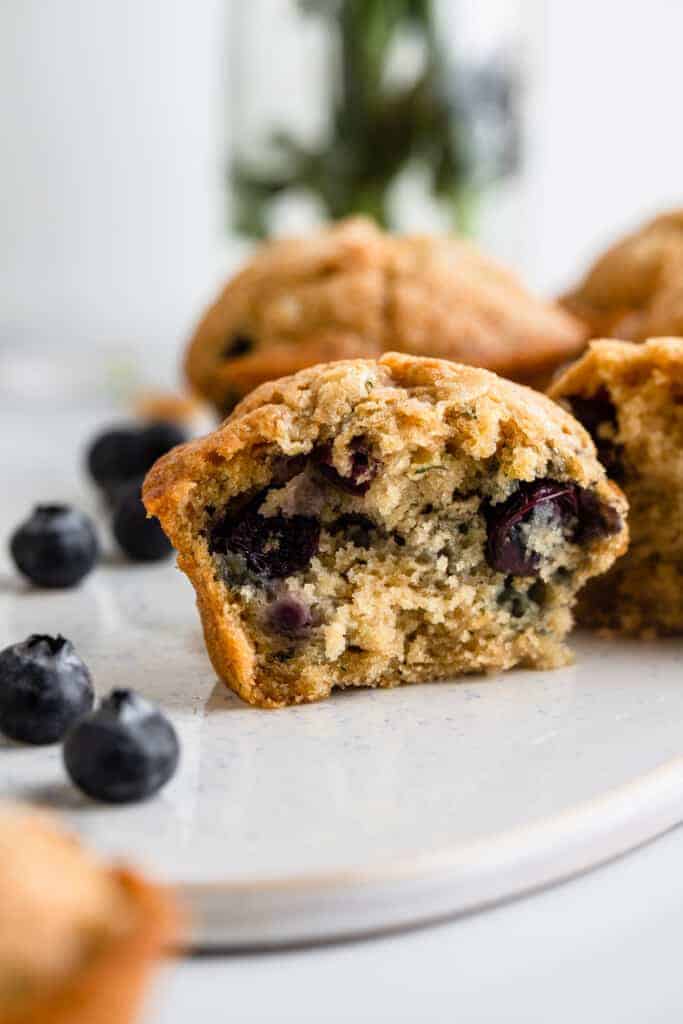 one Zucchini Blueberry Muffins cut in half