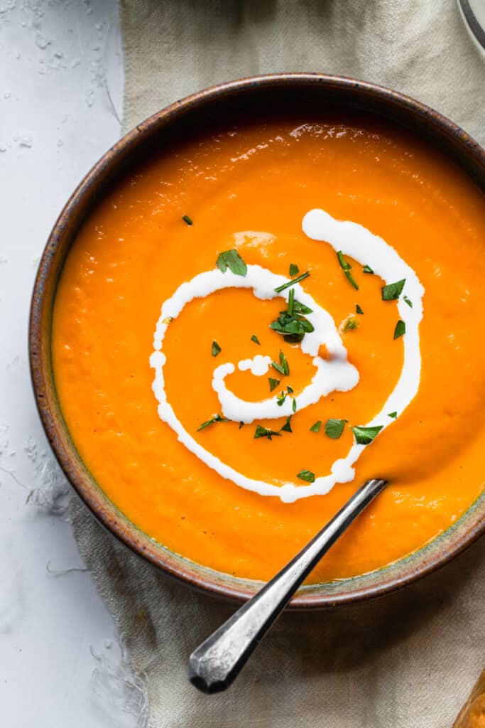 close view of Carrot Ginger Soup in a bowl