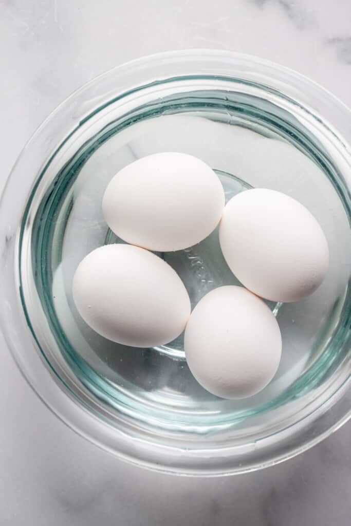 4 Soft Boiled Eggs in the Microwave in a bowl