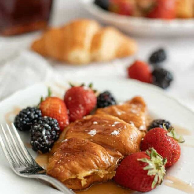 Crispy pastry with mixed berries and syrup on white plate, healthy breakfast, food faith fitness, delicious fruit dessert, fresh strawberries and blackberries, sweet and nutritious treat, summer fruit meal.