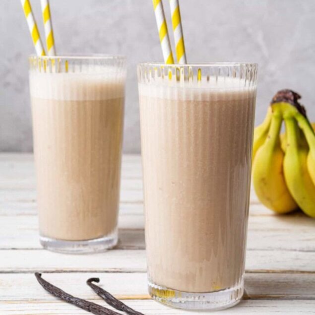 Creamy banana smoothies with fresh bananas and vanilla flavor for healthy breakfast or snack options. Perfect for fitness enthusiasts and those seeking nutritious recipes from Food Faith Fitness.