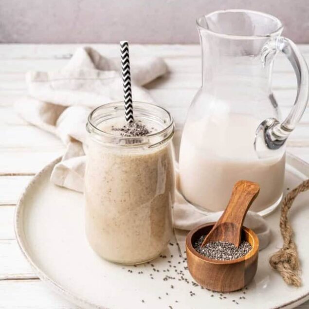 Creamy chia seed pudding with milk and chia seeds on a white tray, healthy breakfast, high-protein, vegan-friendly snack, Food Faith Fitness.
