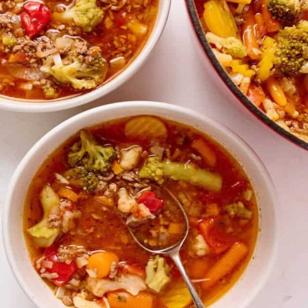 Hearty vegetable beef soup with vegetables and ground beef, healthy and nutritious, perfect for meal prep and family dinners.