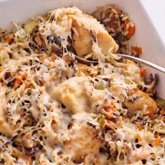 Creamy baked chicken and vegetable casserole with melted cheese, rice, and shredded chicken, ideal for healthy comfort food. Perfect for family dinners and meal prep.