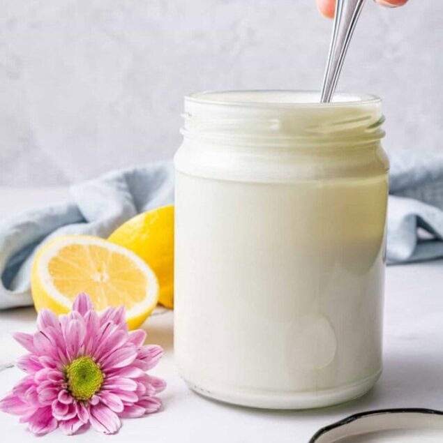 Cream of lemon and honey in a jar for healthy homemade skincare recipes, natural beauty, and self-care routines. Perfect for nourishing and moisturizing skin using natural ingredients.