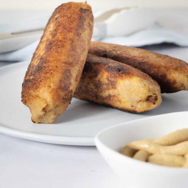 Crispy homemade chicken tenders served with a side of creamy dipping sauce, perfect for a healthy and satisfying meal. Ideal for fitness-friendly recipes and nutritious comfort food choices.