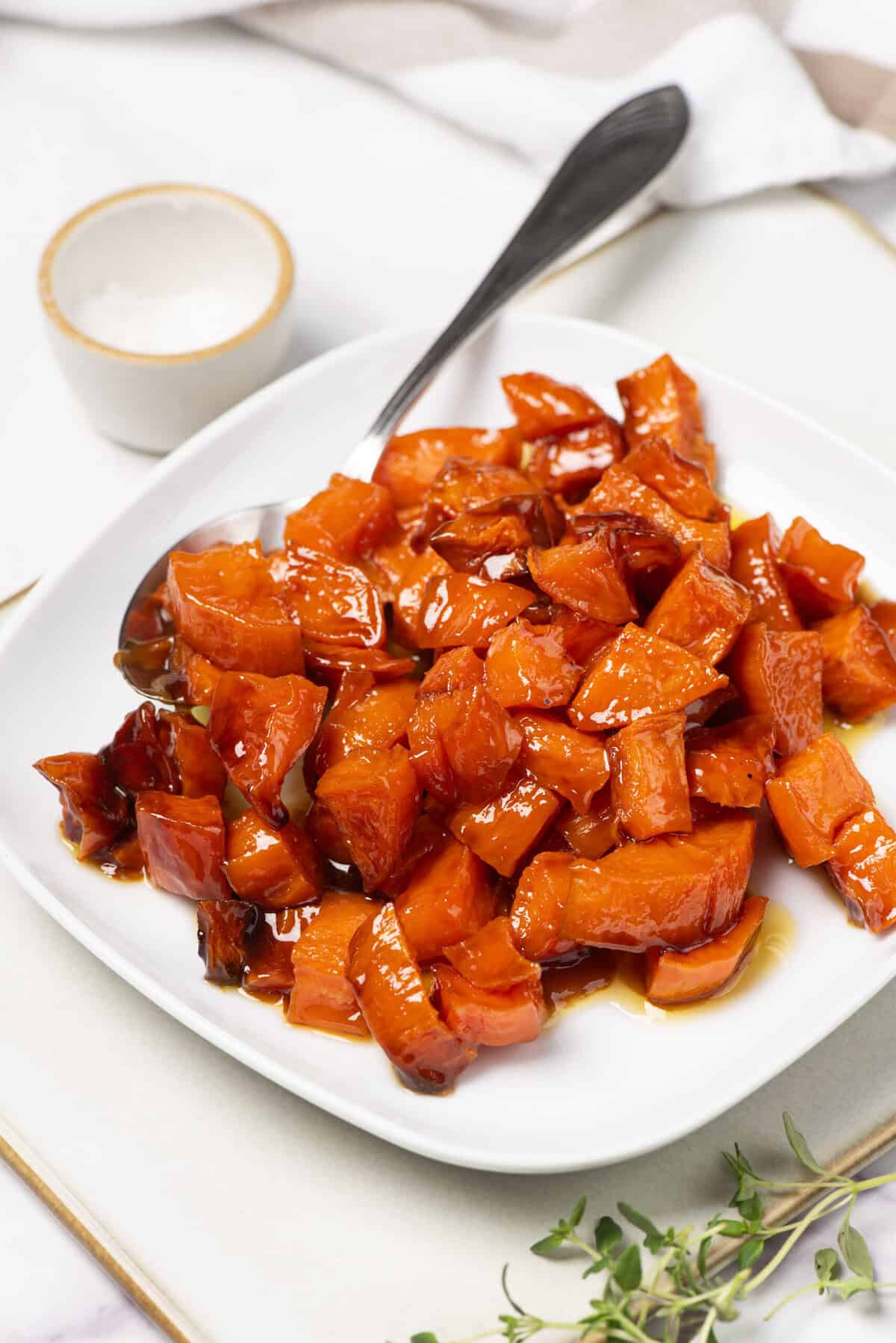 Sweet and savory glazed roasted carrots dish, healthy and easy side recipe, perfect for meal prep and weight loss, vibrant plant-based vegetarian meal, Food Faith Fitness.