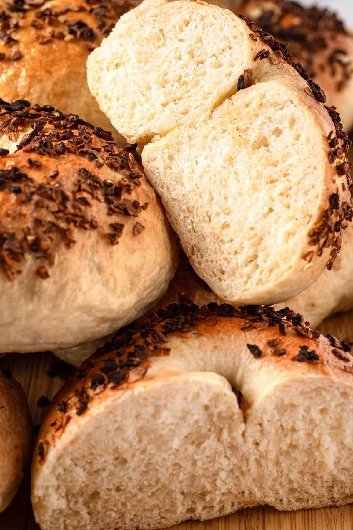 Soft dinner rolls with sesame seeds, fresh from the oven, perfect for sandwiches and healthy eating.