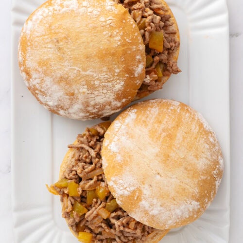 Savory beef and vegetable sandwiches on soft buns, perfect for healthy meal options and quick dinners. Made with ground beef, diced onions, and bell peppers, served on fresh, fluffy bread.