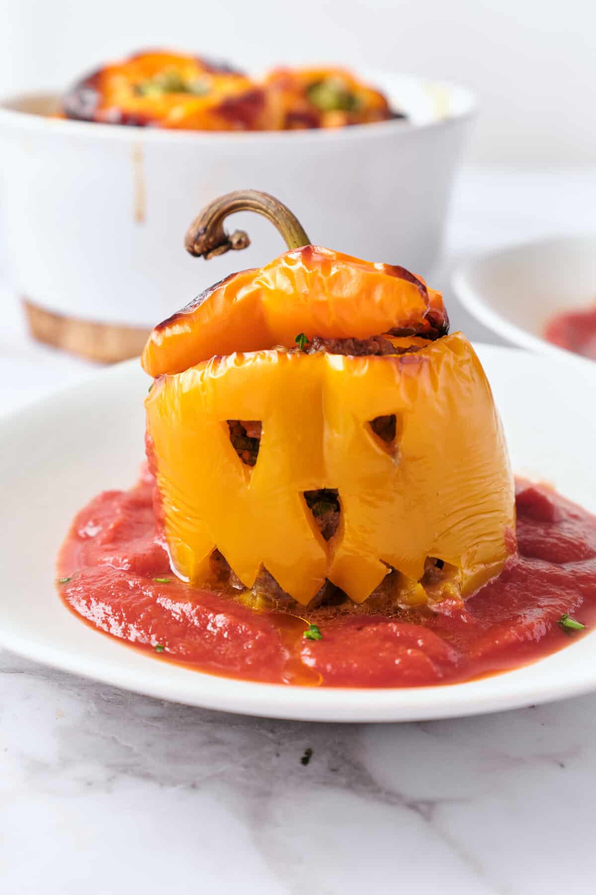 Jack-o-Lantern Stuffed Peppers - foodfaithfitness