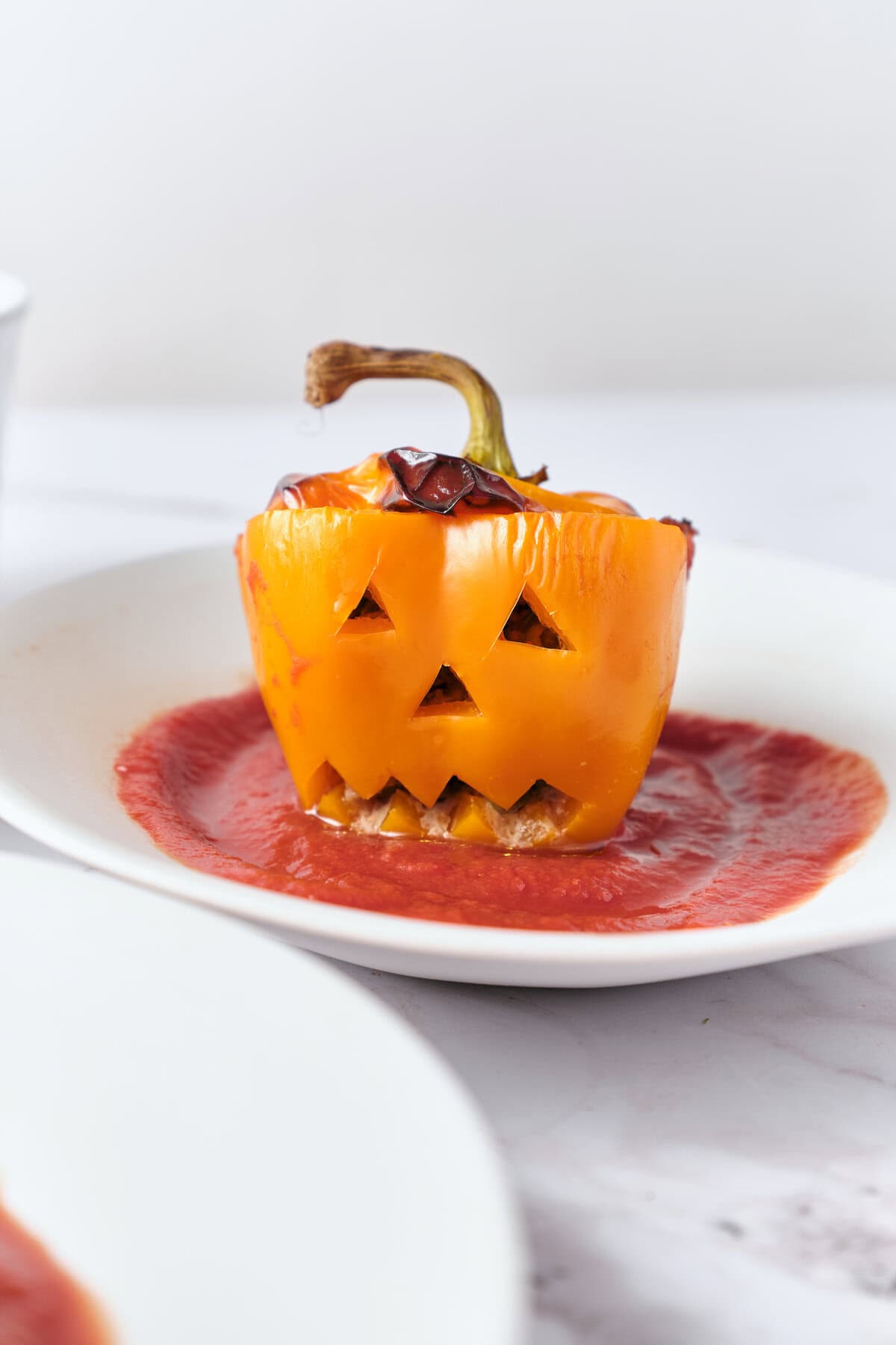 Jack-o-Lantern Stuffed Peppers - foodfaithfitness