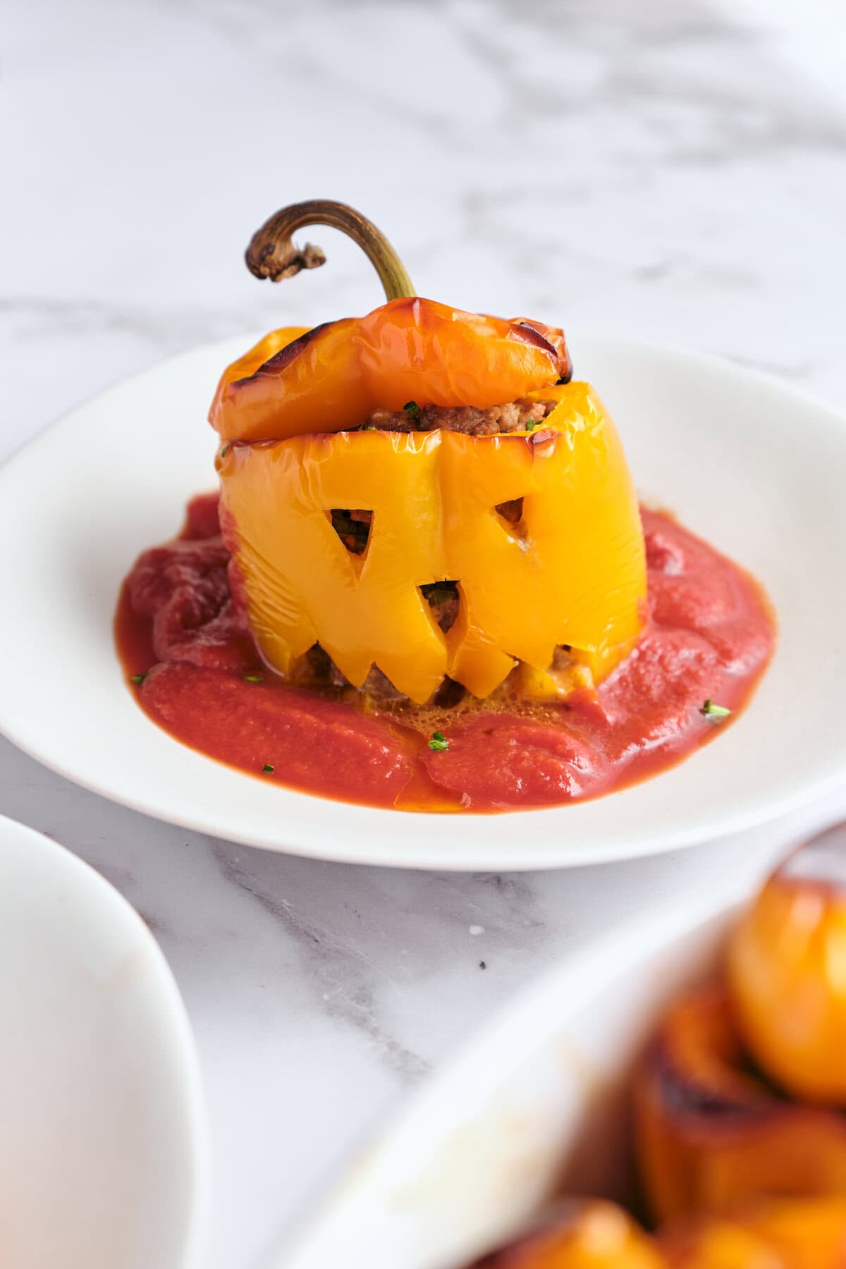Jack-o-Lantern Stuffed Peppers - foodfaithfitness