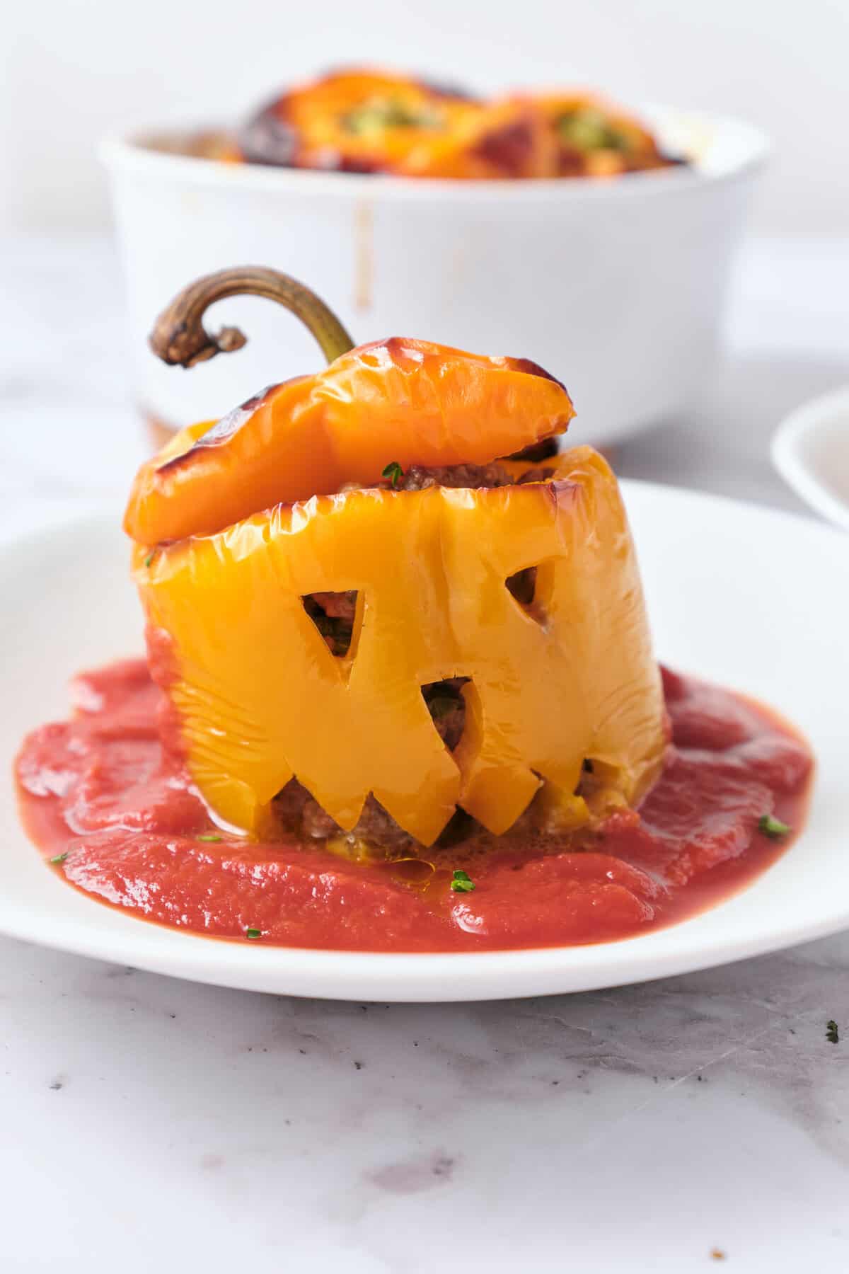 Jack-o-Lantern Stuffed Peppers - foodfaithfitness