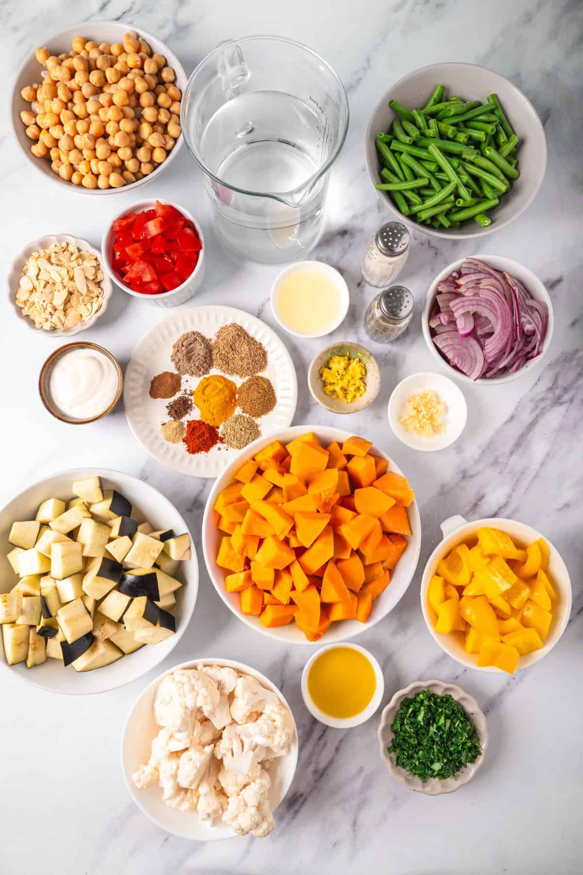 Fresh chopped vegetables and spices for healthy cooking with colorful ingredients.