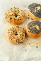 Sourdough bagels with poppy seeds and mixed seeds.