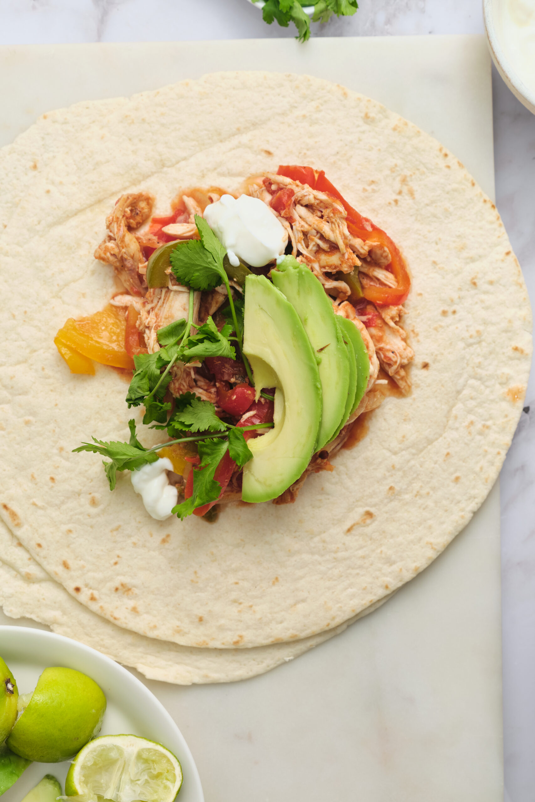 Slow Cooker Chicken Fajitas on Tortillas